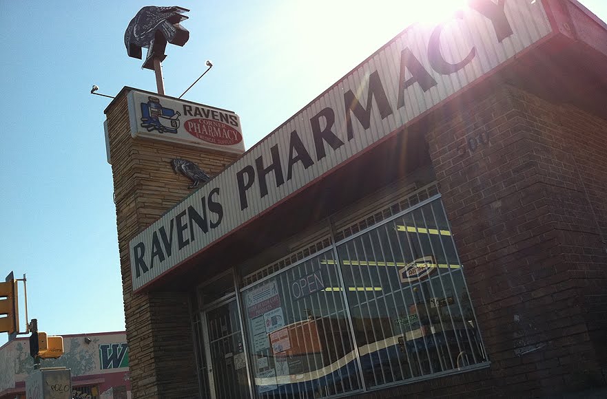 Raven’s Pharmacy storefront on Jefferson Boulevard with its elevated raven sign, photographed for a 2011 location story
